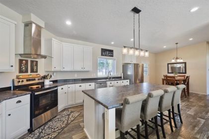 BEAUTIFUL 4 BED, 2 BATH HOME ON A WOODED 10-ACRE LOT