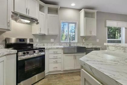 LOON LAKE HOME ON 5+ ACRES