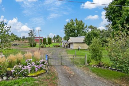 BEST OF BOTH WORLDS! WEST PLAINS FARMHOUSE, 4.6 ACRES