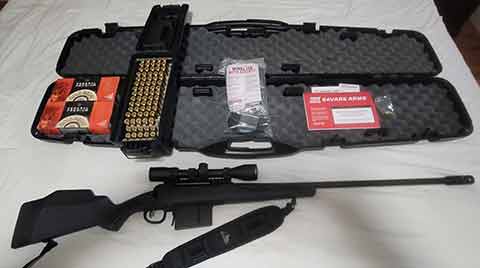 SAVAGE ARMS 338 LAPUA WITH VORTEX 4-12 SCOPE