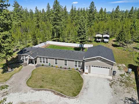 BEAUTIFUL 4 BED, 2 BATH HOME ON A WOODED 10-ACRE LOT