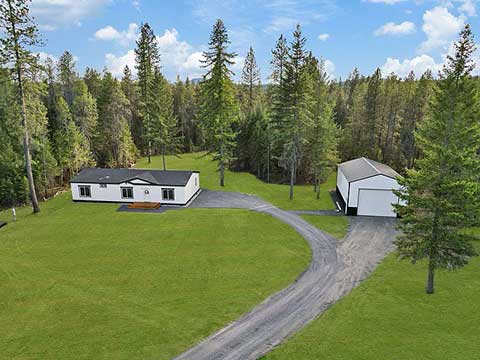 NEW HOME ON 5+/- WOODED ACRES