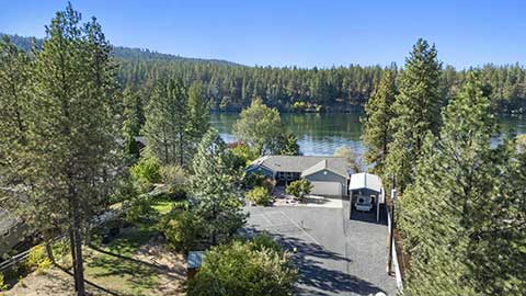 HOME WITH 147' OF SPOKANE RIVERFRONT ON A 1.17 ACRE LOT
