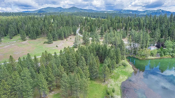 5 ACRES OF PRIMARY WATER FRONT ON THE PEND OREILLE RIVER
