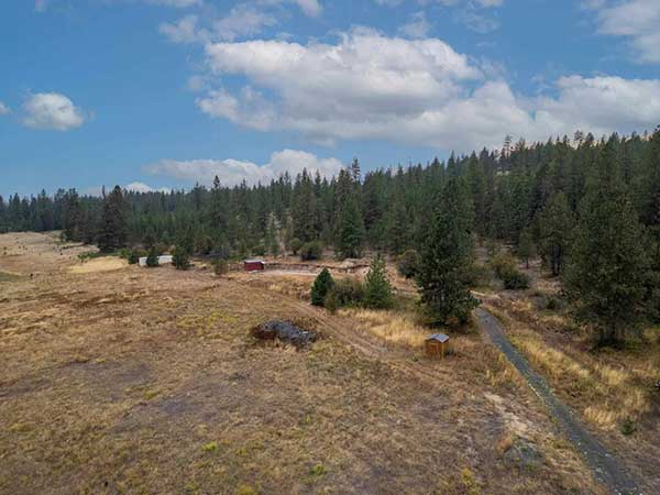READY TO LIVE IN TINY HOME ON 19.38 ACRES