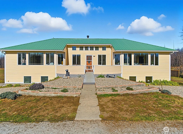 ENJOY PEACEFUL LIVING ON 10 LEVEL ACRES IN ELK