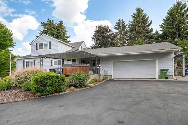 CHARMING UPDATED FARMHOUSE ON 7 ACRES