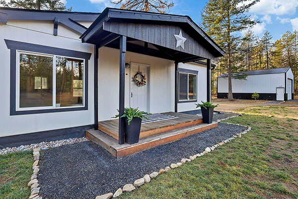 LOON LAKE HOME ON 5+ ACRES