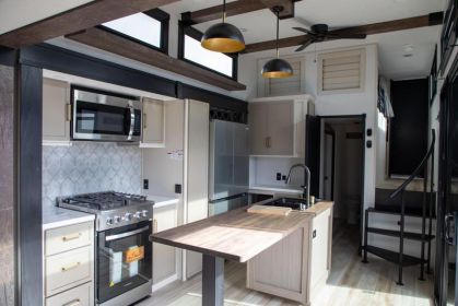 THIS LOFT TRAVEL TRAILER WITH 5 SLIDES  