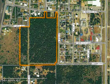 OPPORTUNITY KNOCKS FOR THIS 23+ ACRES, IN CITY LIMITS OF ATHOL!