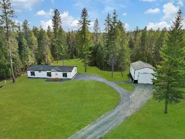 LOON LAKE HOME ON 5+ ACRES