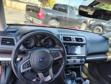 THIS VERY CLEAN 2017 RED SUBARU OUTBACK