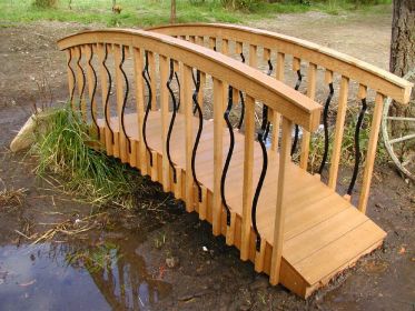 ENHANCE YOUR LANDSCAPE WITH A BEAUTIFUL BRIDGE