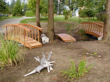 ENHANCE YOUR LANDSCAPE WITH A BEAUTIFUL BRIDGE