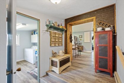 BEST OF BOTH WORLDS! WEST PLAINS FARMHOUSE, 4.6 ACRES