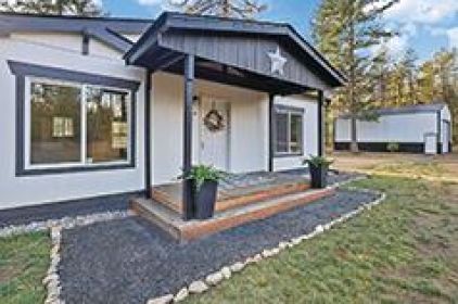 LOON LAKE HOME ON 5+ ACRES