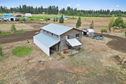 BEST OF BOTH WORLDS! WEST PLAINS FARMHOUSE, 4.6 ACRES