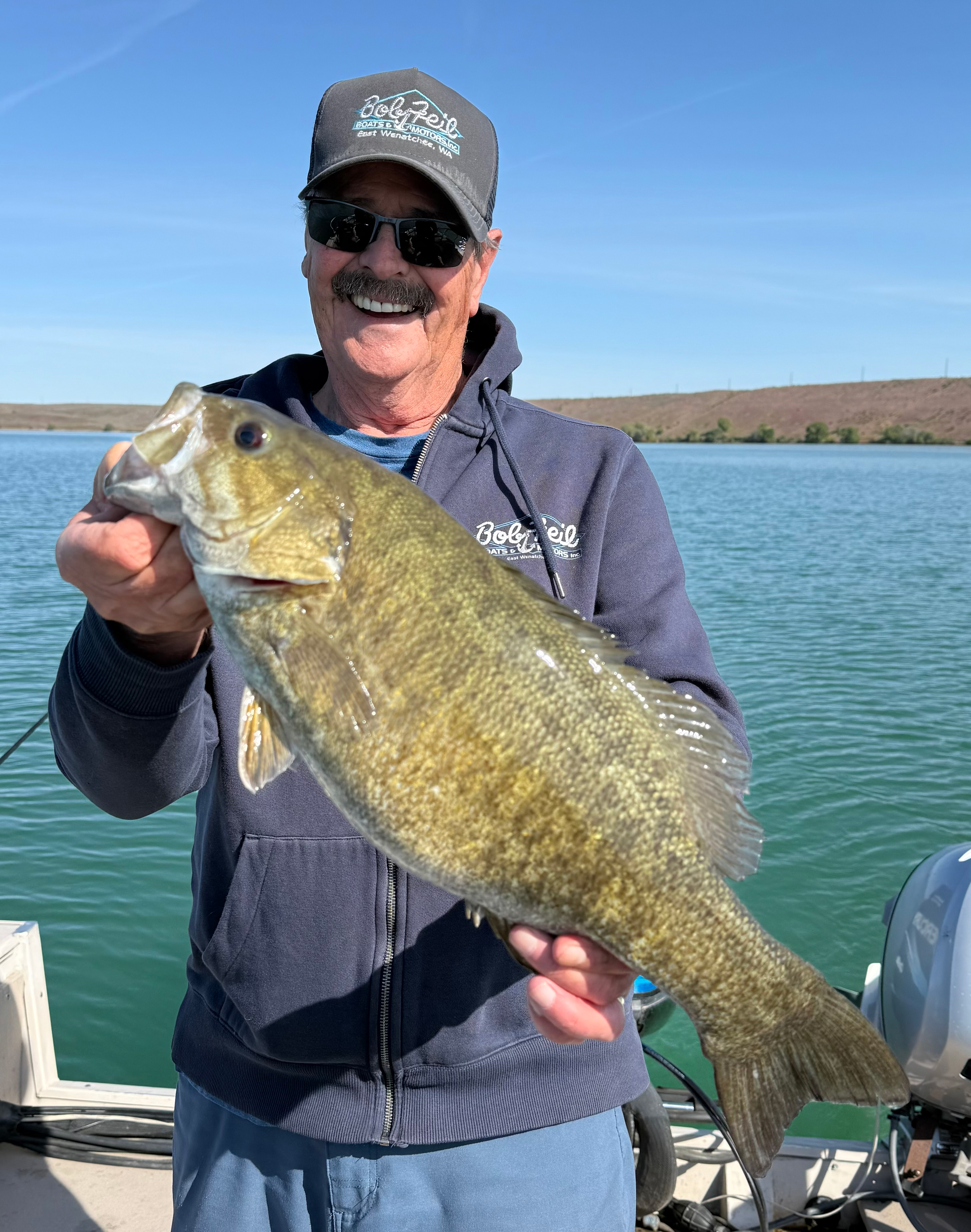 A trophy-sized 19-inch smallmouth bass caught at Moses Lake during a spring fishing trip.