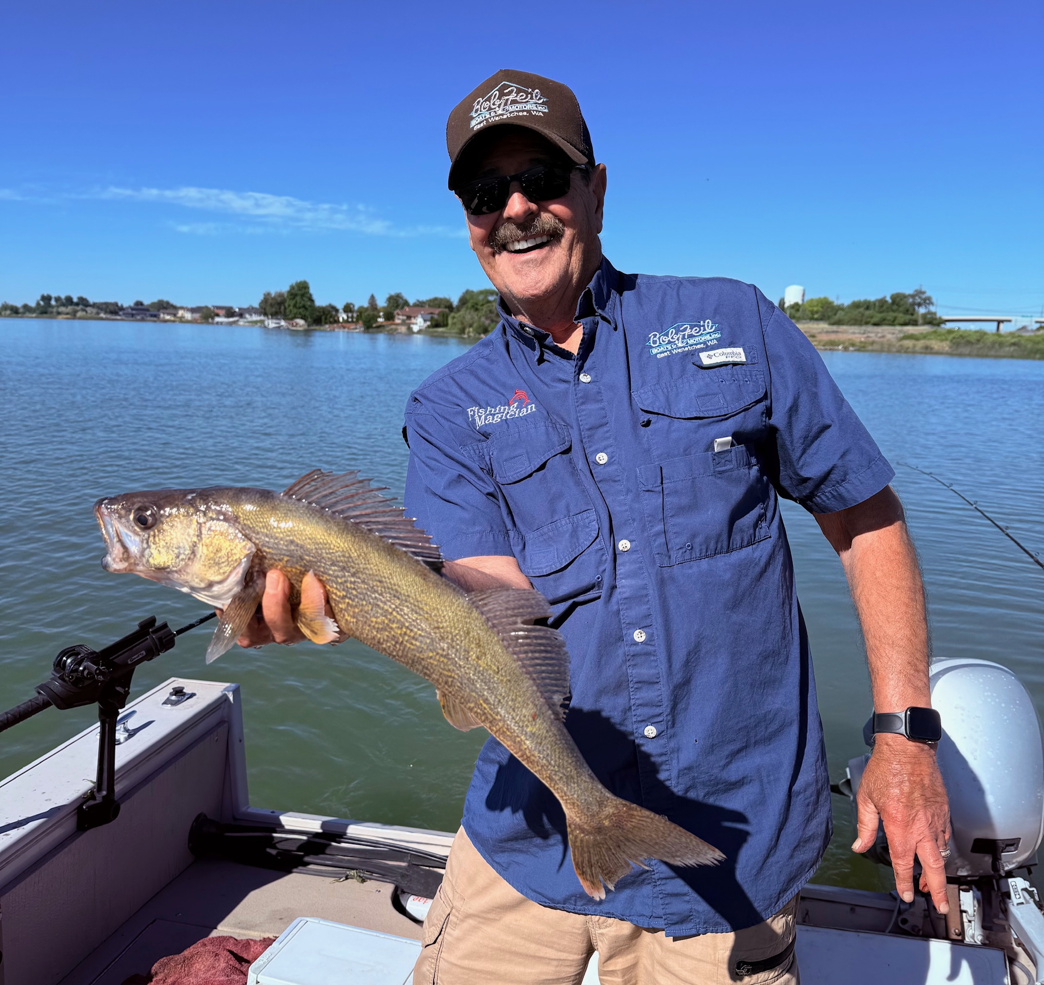 Dave holding a 21-inch walleye caught on Moses Lake during a productive early morning trip.